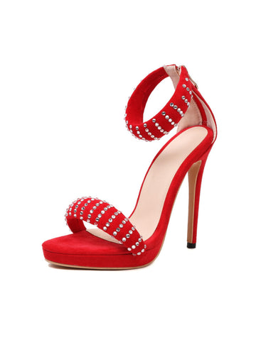 Red high-heeled shoe with rhinestone embellishments