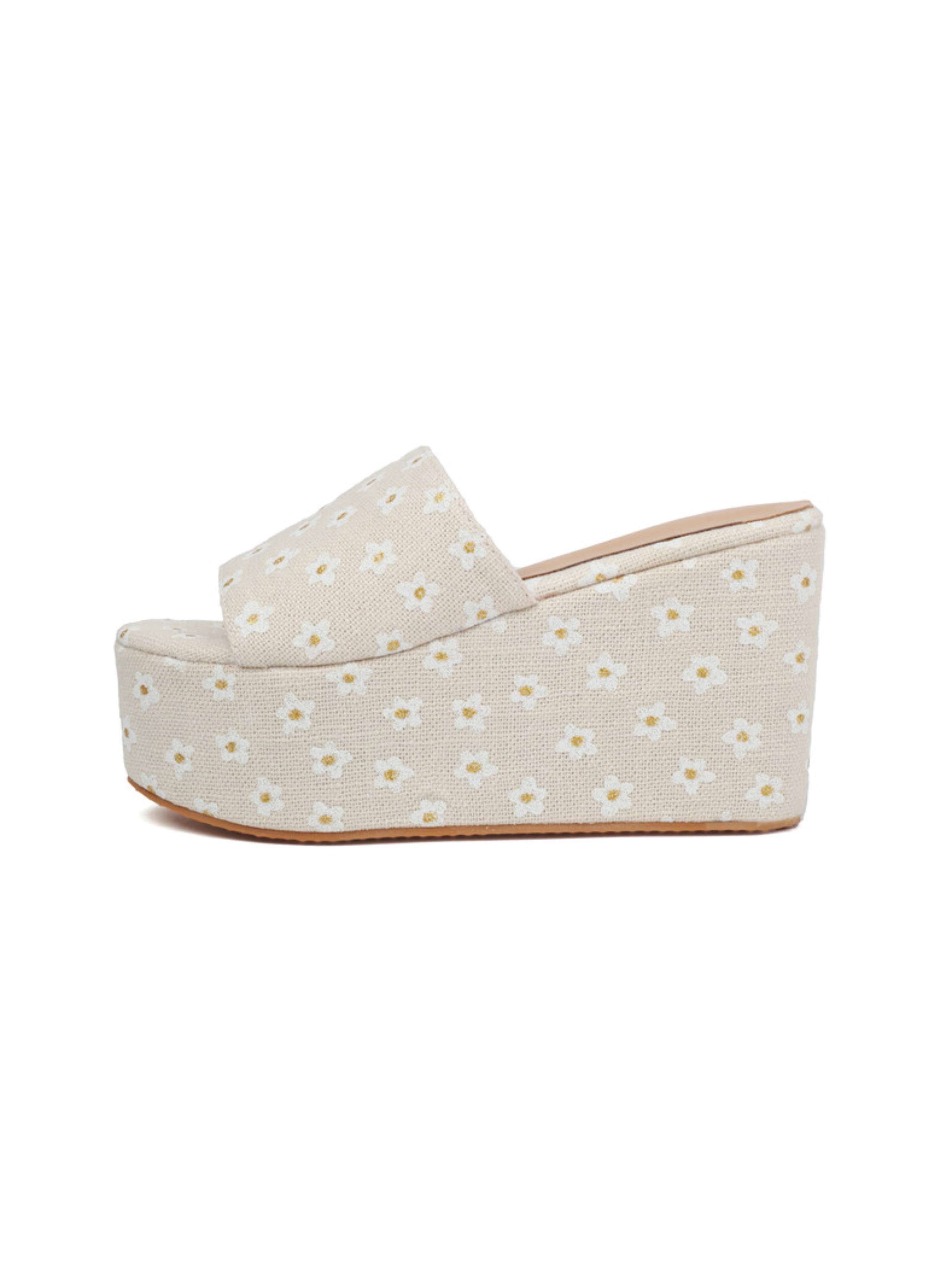 White wedge sandal with floral pattern