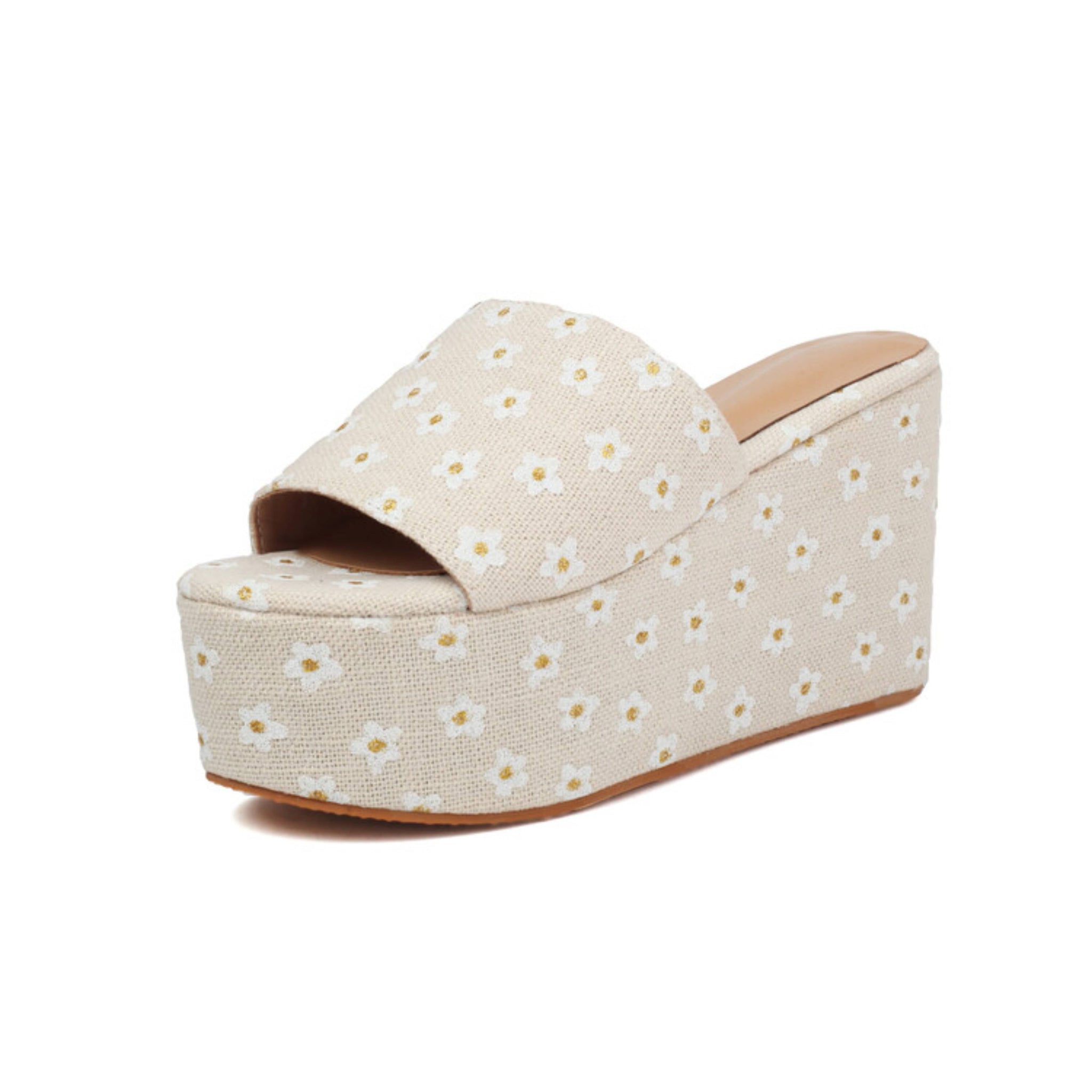 Beige wedge sandal with floral pattern