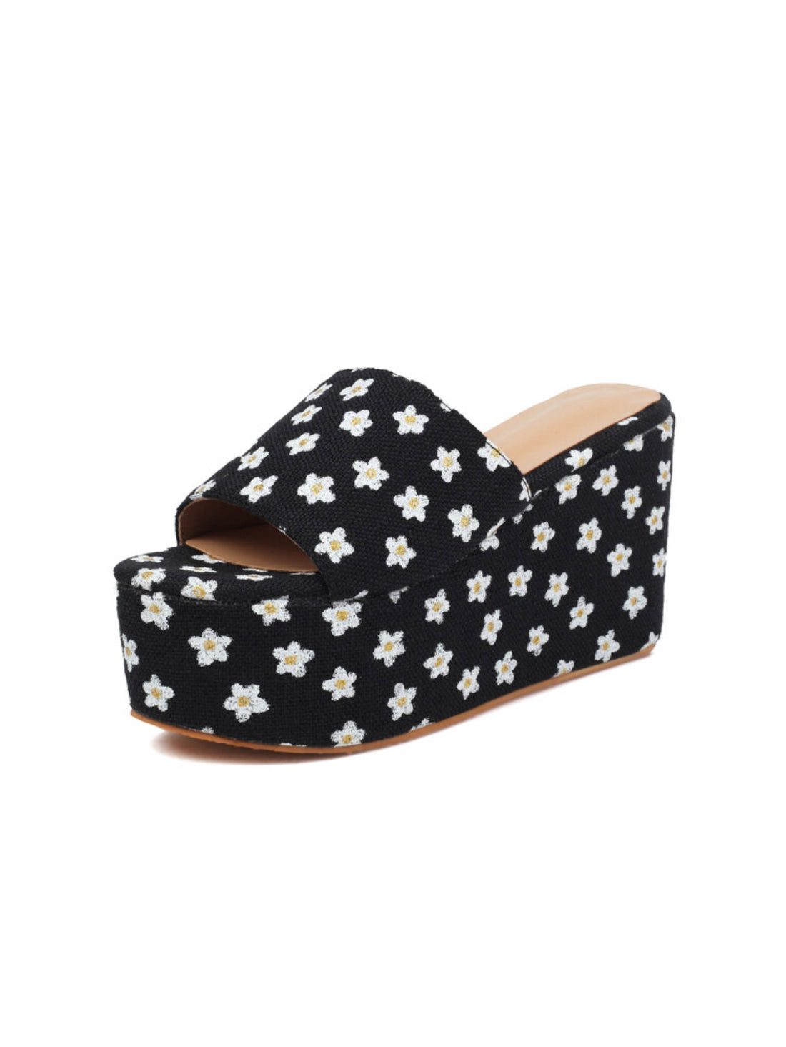 Black wedge sandal with white floral pattern