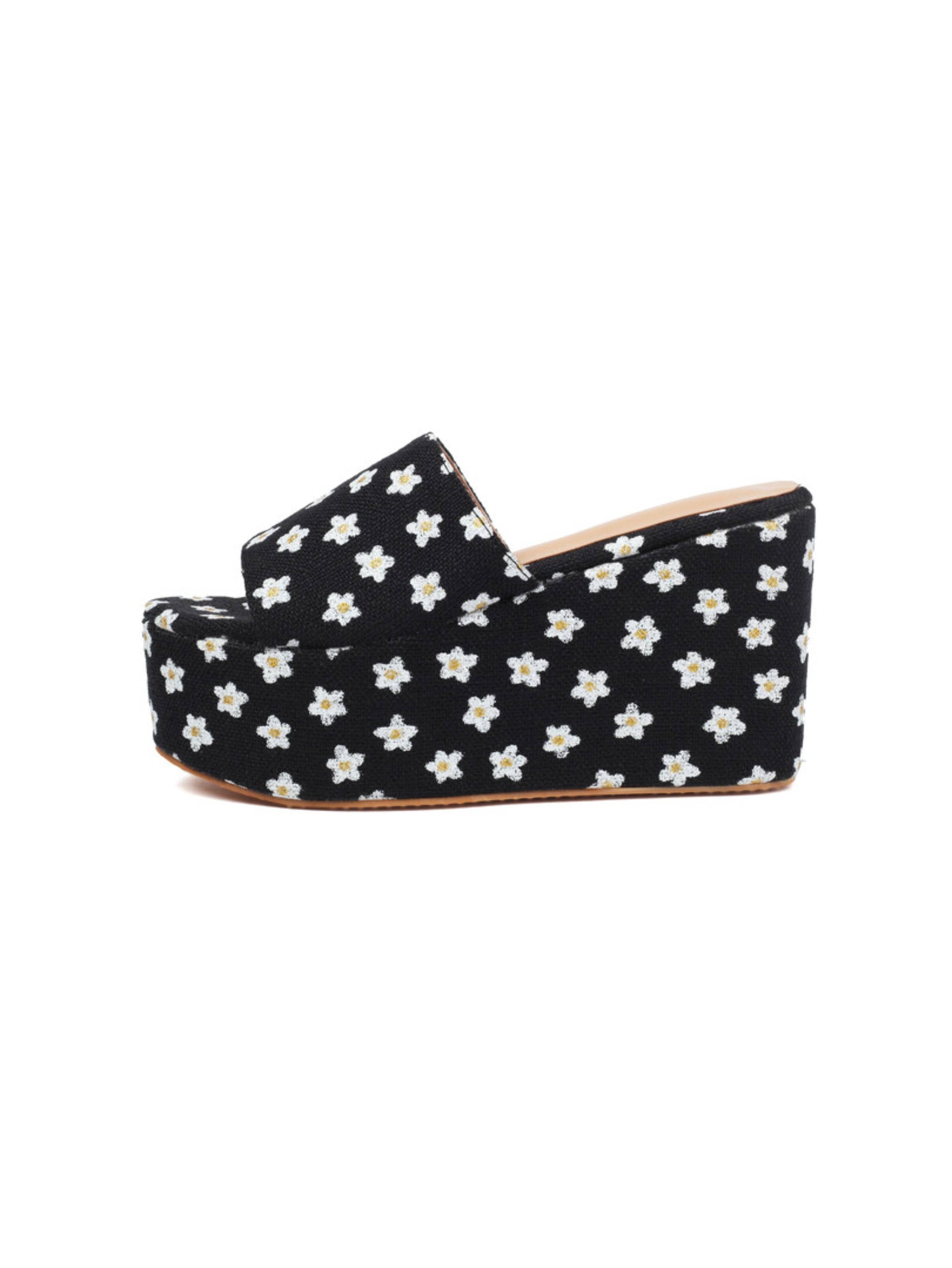 Black wedge sandal with white floral pattern