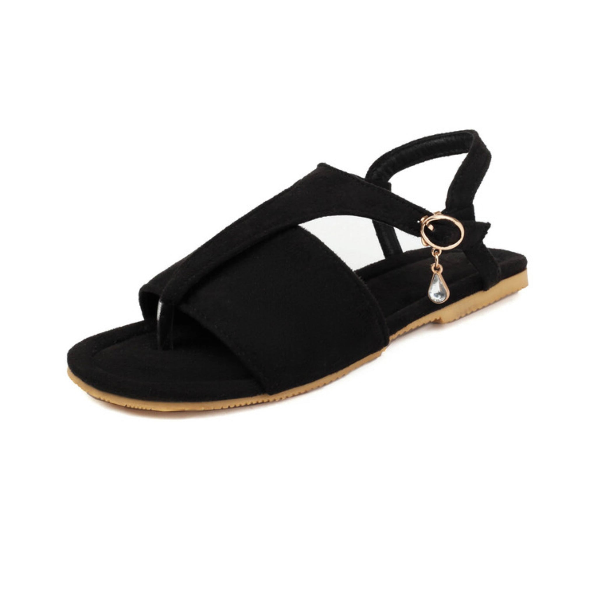 Black sandal with a decorative charm