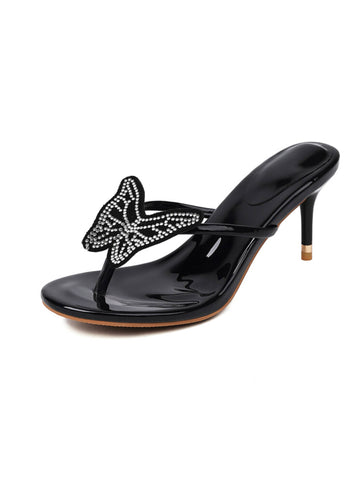 Black high-heeled sandal with butterfly