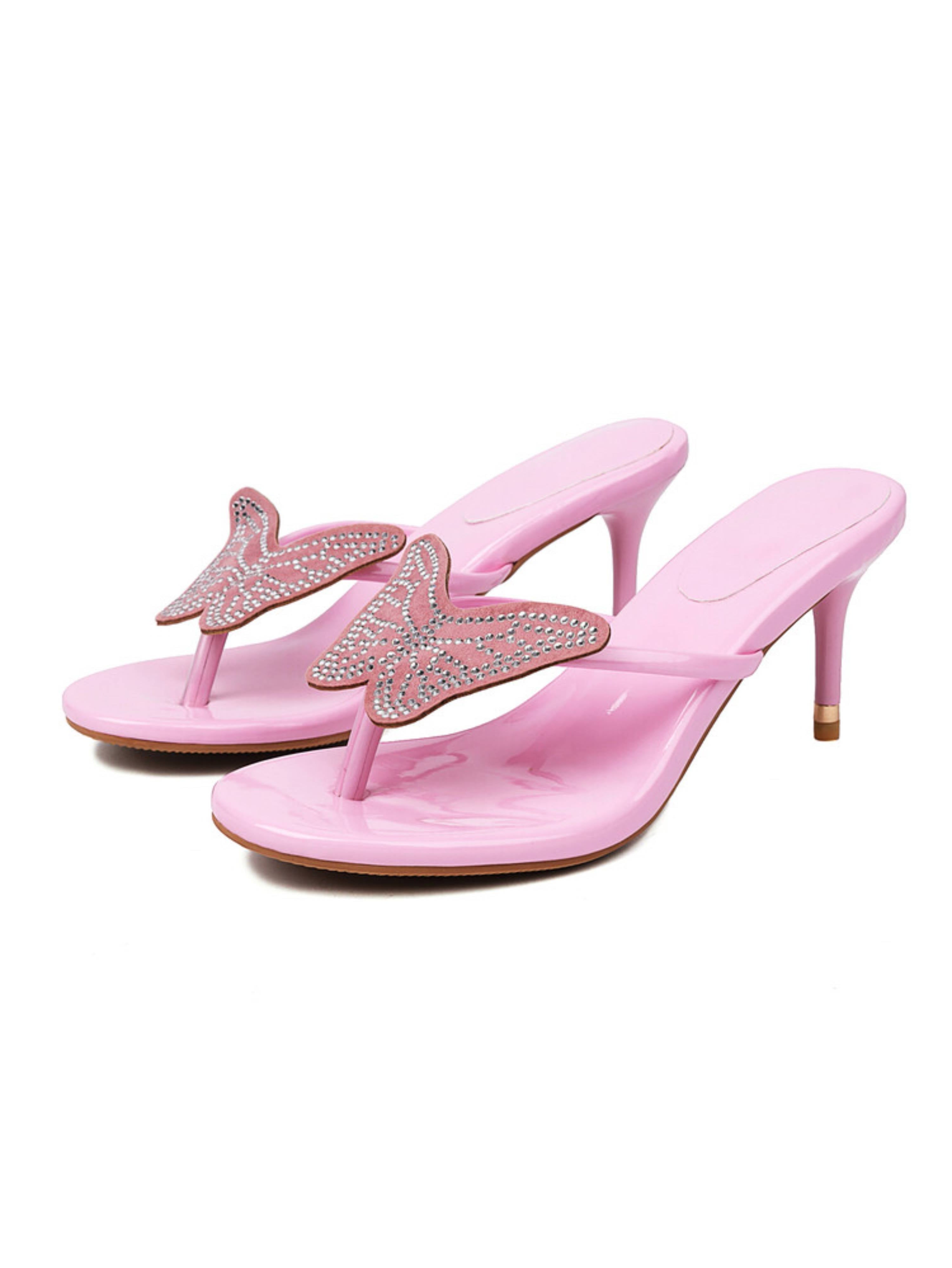 Pink high-heeled sandals with butterfly embellishments
