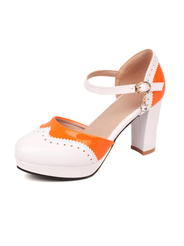 White and orange shoe with a block heel