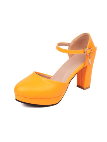Orange high-heeled shoe with a platform