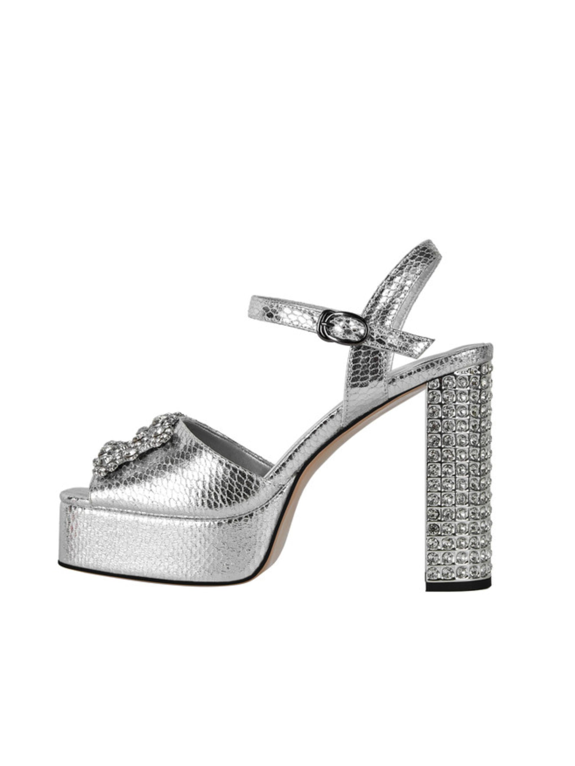 Silver high-heeled shoe with platform and embellishments