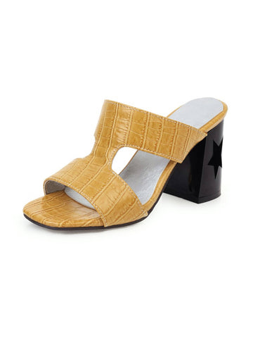 Yellow high-heeled sandal with black heel